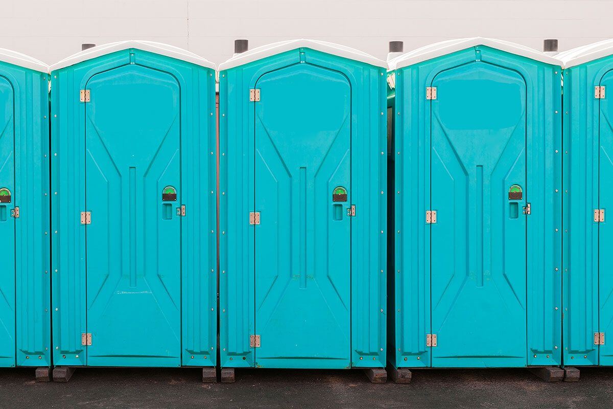 Industrial portable restroom units at a plant in Crescent City, California